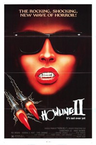 Promotional poster for HOWLING II featuring a fanged femme-fatale in sunglasses, two tears down the left of the poster, and the tagline "It's not over yet"