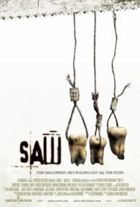 Promotional poster for SAW 3 featuring teeth hung by noose-tied wires and the tagline "This Halloween, he's pulling out all the stops"