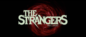 The Strangers: Prey at Night title screen, featuring a swirling red behind white text of "The Strangers: Prey At Night"